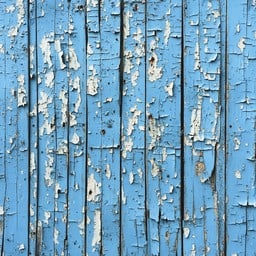 Professional painting a wooden fence in Camps Bay overlooking the Atlantic Ocean